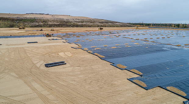 the construction of the landfill and installation of geomembrane. Aerial view
